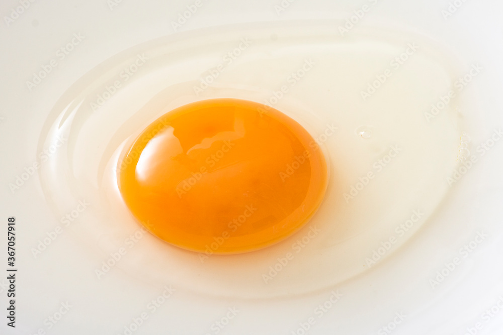 A close-up of yolks and runny eggs A close-up of yolks and runny eggs