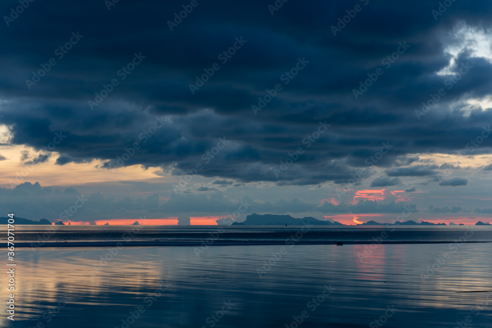 Sunset dramatic tropical big rain cloud blue sky and sea Sunset dramatic tropical big rain cloud blue sky and sea