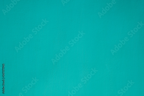 Turquoise color paper texture background. Texture of light green cardboard closeup