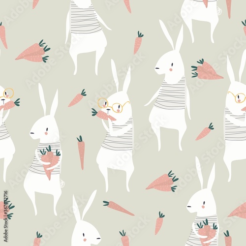 Seamless pattern with cute rabbits and carrots