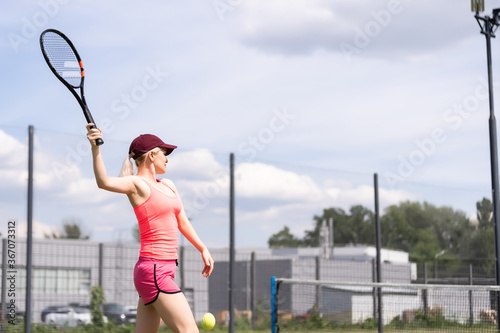 Woman playing tennis and waiting for the service © Angelov