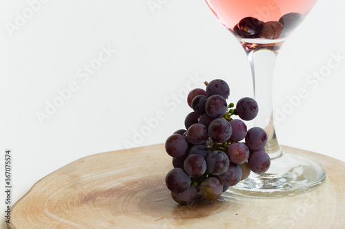 Isolated grape and wine. Alcoholic beverage product, space for text photo