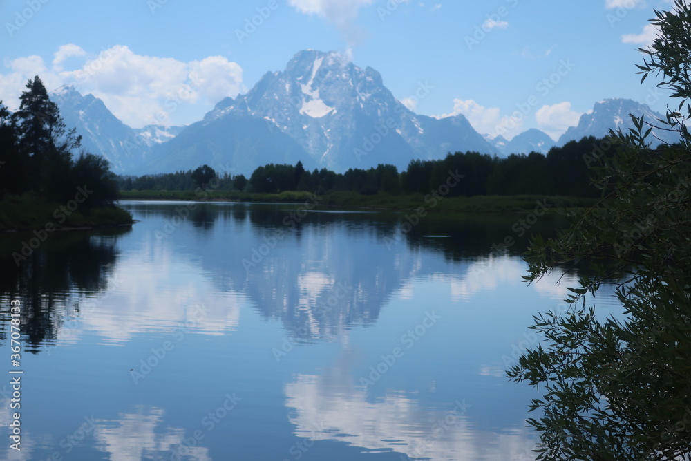 Reflective lake and Mount Moran in the Tetons