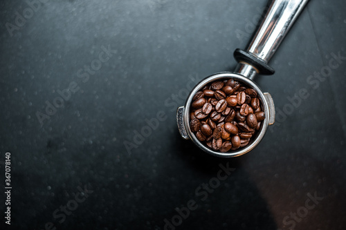 the coffee beans in to the coffee tamper