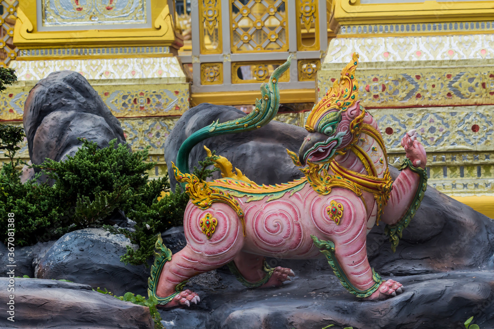 Fototapeta premium Close-up Himmapan animal statue in temple Thailand.
