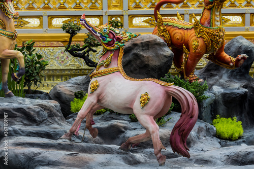 Close-up Himmapan animal statue in temple Thailand. photo