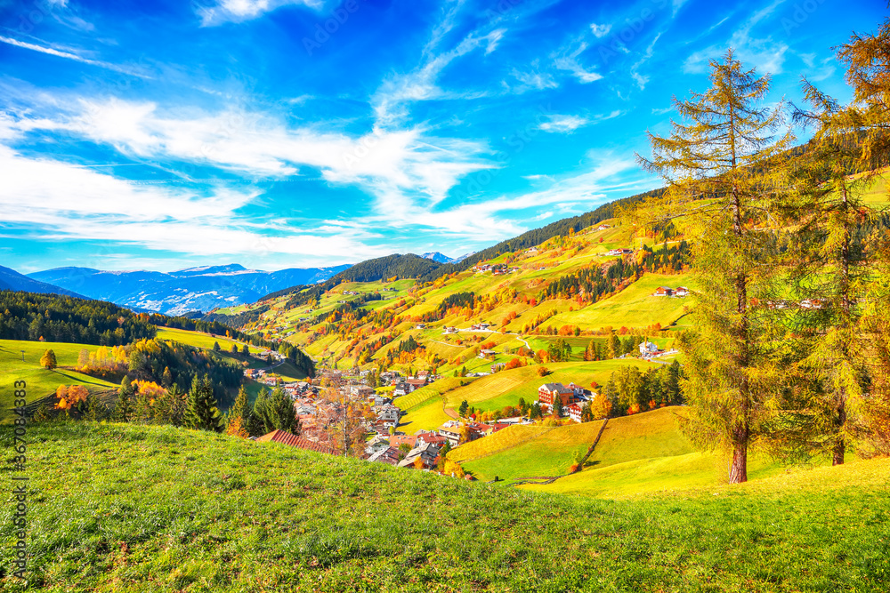 Awesome autumn scene of magnificent  Santa Maddalena village in Dolomites