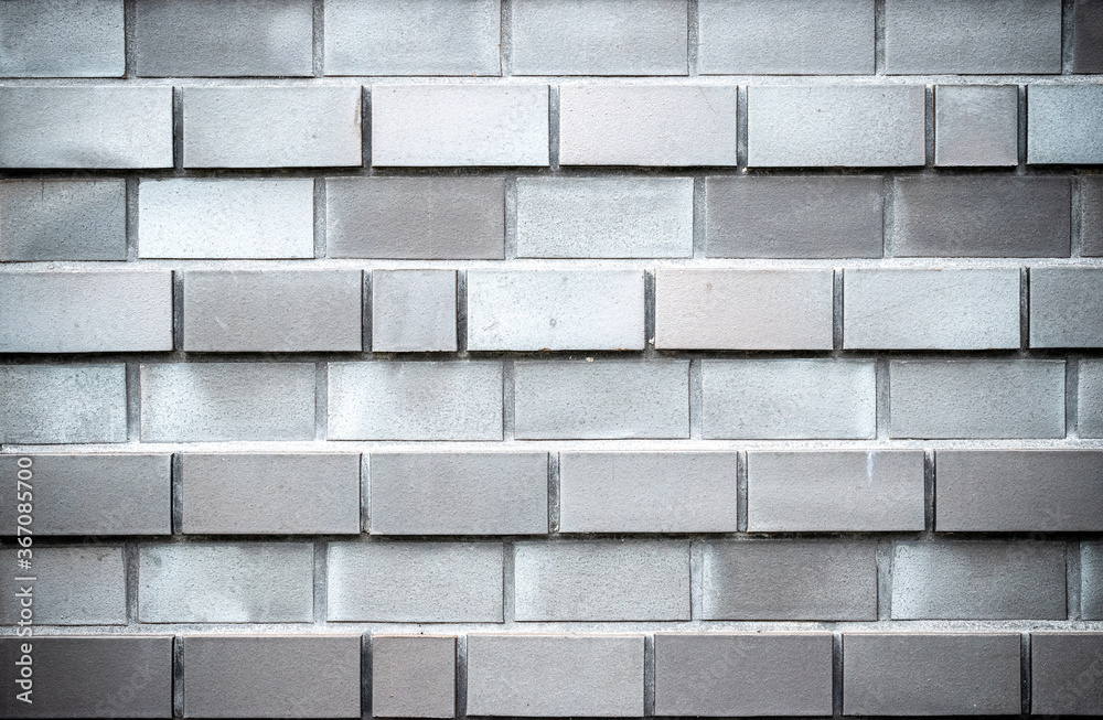 Naklejka premium Worn grunge. Old rough stone on cement pattern wall background. Vintage grunge plaster or concrete stucco surface. Natural material abstract structure backdrop.