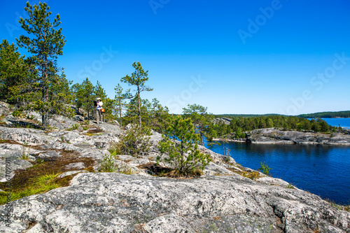 Fototapeta Naklejka Na Ścianę i Meble -  View from Koyonsaari Island to Sammalsaari. Bay Tervu. Ladoga lake. Karelia. Russia