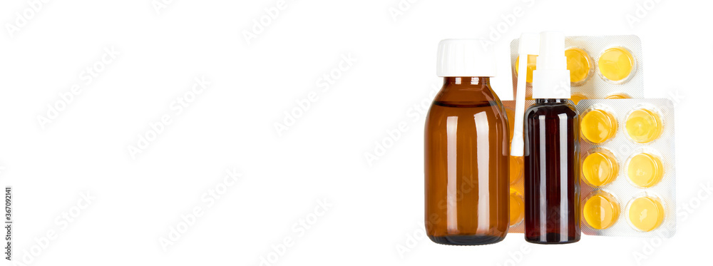 Throat ache pills in bister, spray and syrup, isolated on white background. Copy space template, banner. Throat ache pills in bister, spray and syrup, isolated on white background. Copy space template, banner.