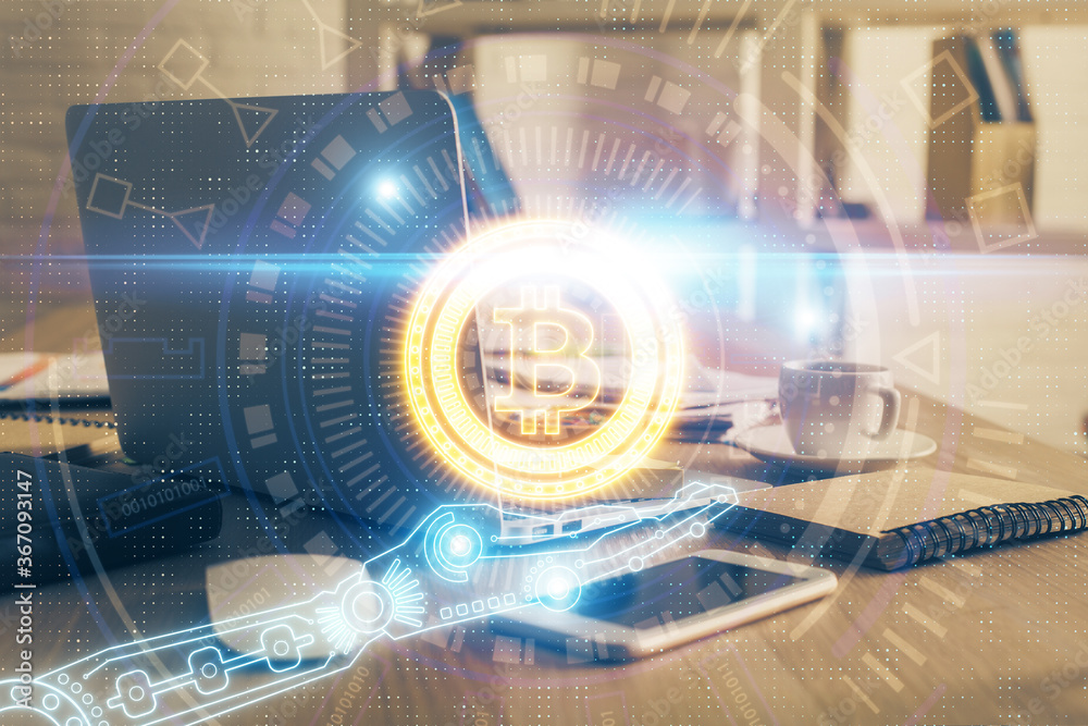 Multi exposure of blockchain theme hologram and table with computer background. Concept of bitcoin crypto currency. Multi exposure of blockchain theme hologram and table with computer background. Concept of bitcoin crypto currency.