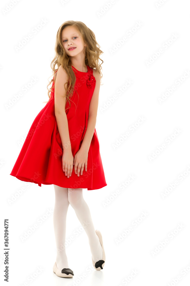 Full Length Portrait of Girl in Red Stylish Dress Posing in Studio