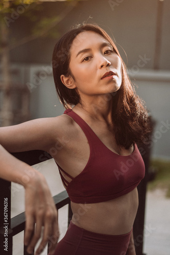 Fit woman in sportswear at the park. Free Download Fit woman in sportswear at the park. - GFXLoad