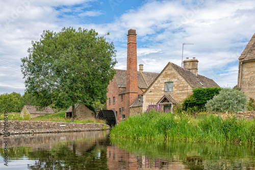 The Old Mill on the River Eye in Lower Slaughter, The Cotswolds, Gloucestershire, United Kingdom
