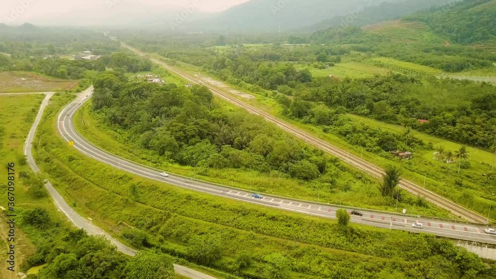 Aerial view of railway track among forests Port Dickson Malaysia Aerial view of railway track among forests Port Dickson Malaysia