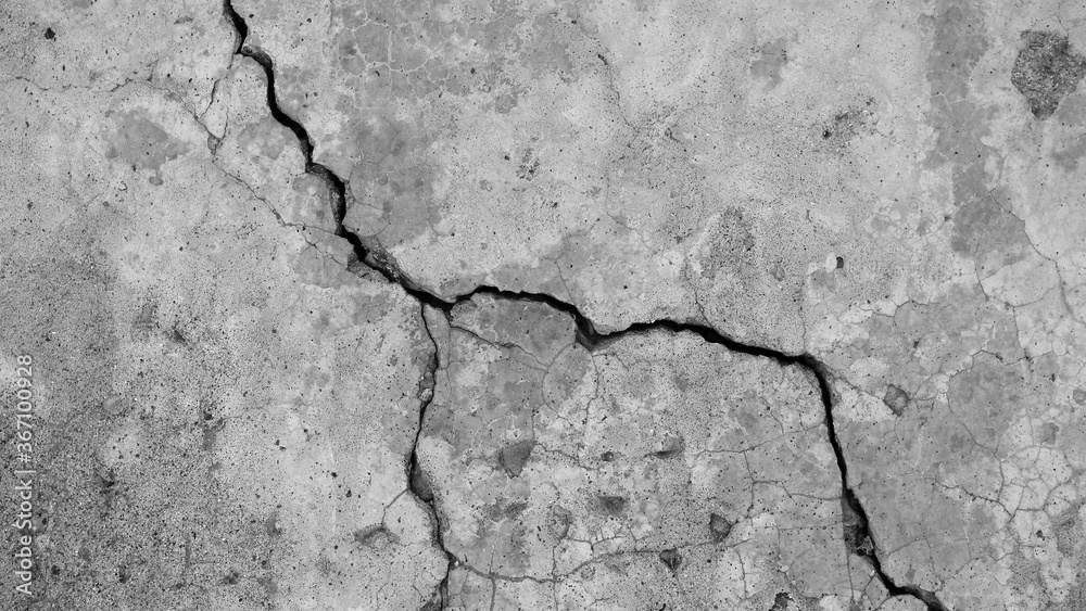 Obraz premium Building wall concrete surface. Crack. Background image for web design.