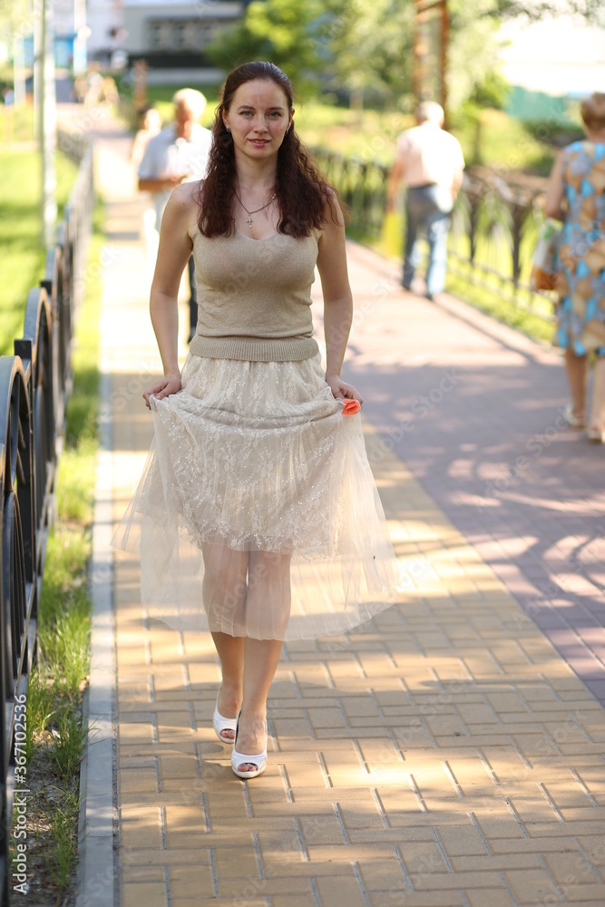 Young woman portrait in the park