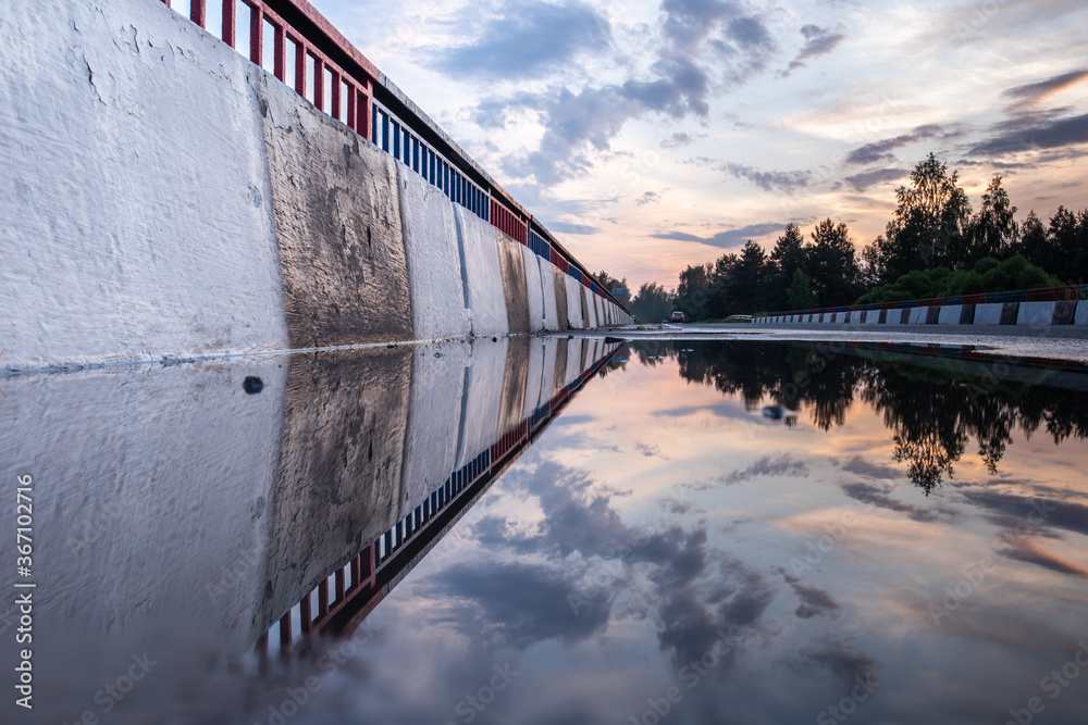 Fototapeta premium Asphalt road. Natural background. Sunset.