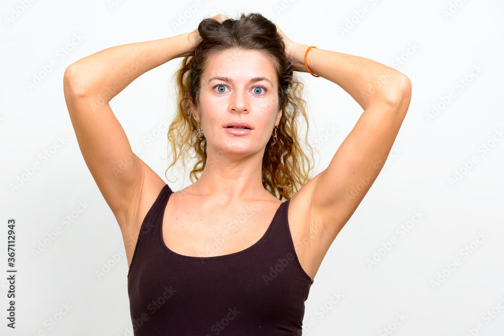 Portrait of young beautiful woman with curly blond hair Portrait of young beautiful woman with curly blond hair