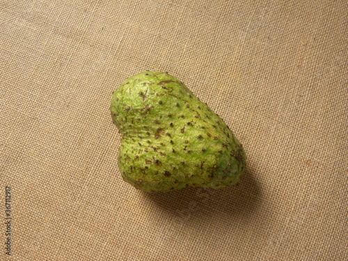 Green color whole ripe Soursop fruit or Annona muricata photo