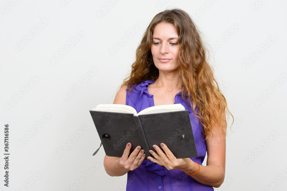Portrait of young beautiful businesswoman with curly blond hair Portrait of young beautiful businesswoman with curly blond hair