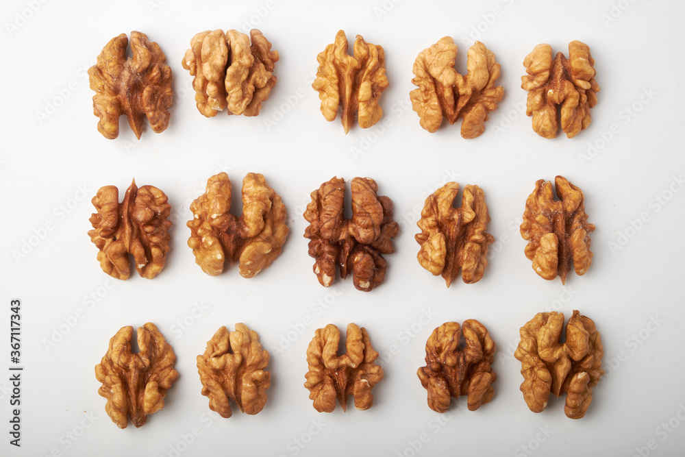 Walnut kernels are isolated on a white background. Walnut kernels are isolated on a white background.
