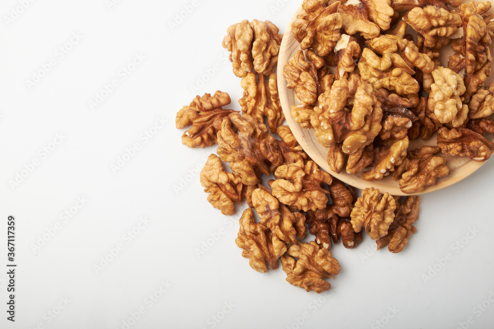 Walnut kernels are isolated on a white background. Walnut kernels are isolated on a white background.
