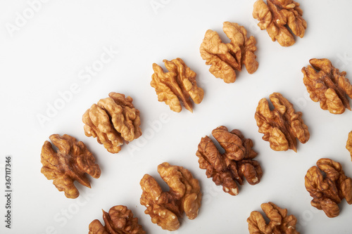 Walnut kernels are isolated on a white background.