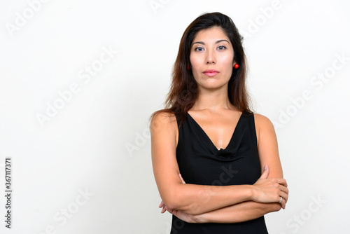 Portrait of young beautiful woman with arms crossed