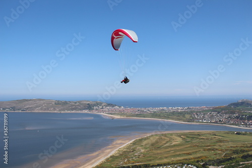 paraglider over the sea at Conwy Mountain