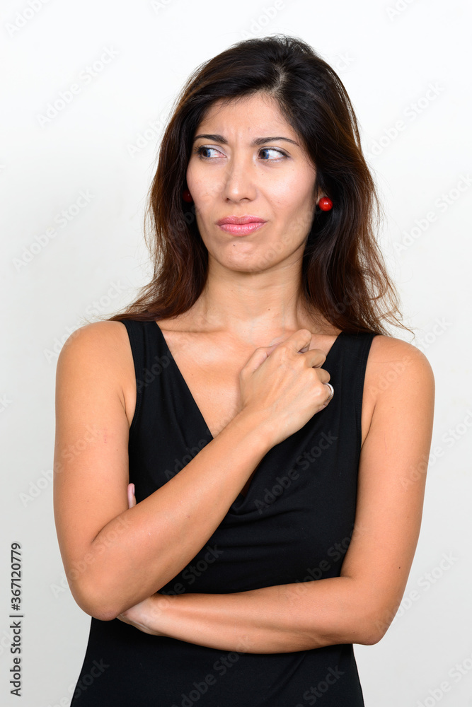 Portrait of stressed young woman looking disgusted Portrait of stressed young woman looking disgusted