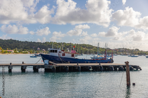 Fishing boat docked at pier in Tyrell bay in Carriacou, Grenada