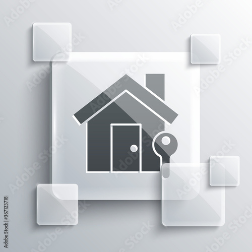 Grey House with key icon isolated on grey background. The concept of the house turnkey. Square glass panels. Vector Illustration.