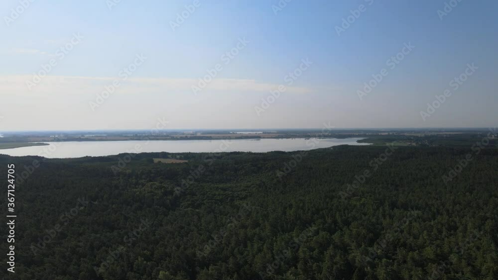 Flight over the beach Aerial view of the gentle waves crashing on the sandy beach by the Baltic Sea Flight over the beach Aerial view of the gentle waves crashing on the sandy beach by the Baltic Sea