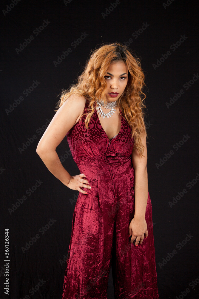 Lovely Hispanic woman with her hand in her hair Lovely Hispanic woman with her hand in her hair