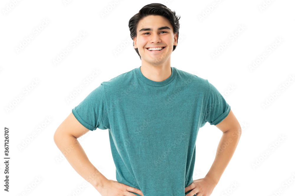 Smiling Handsome Man Standing With Arms Akimbo Smiling Handsome Man Standing With Arms Akimbo