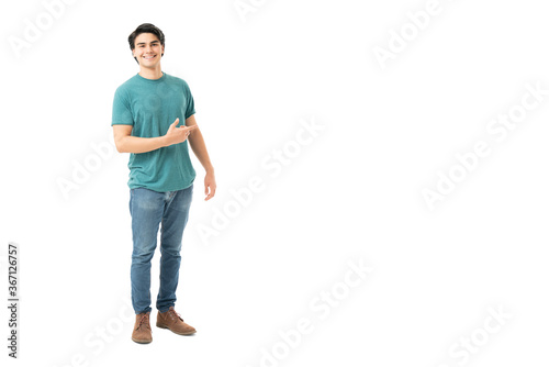 Happy Young Man Showing Copy Space
