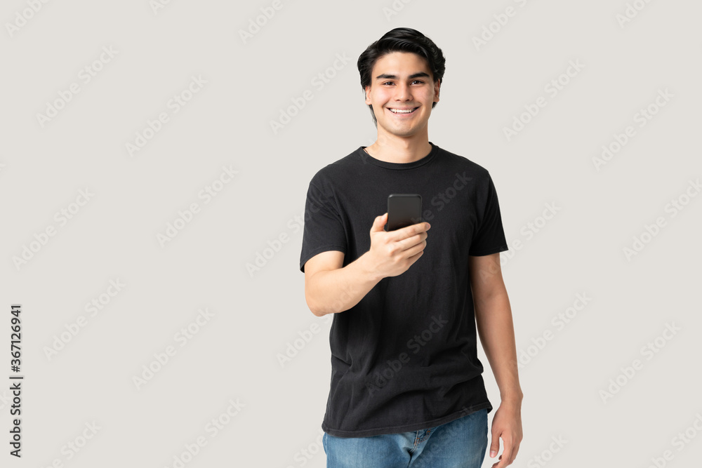 Smiling Man Holding Mobile Phone Smiling Man Holding Mobile Phone