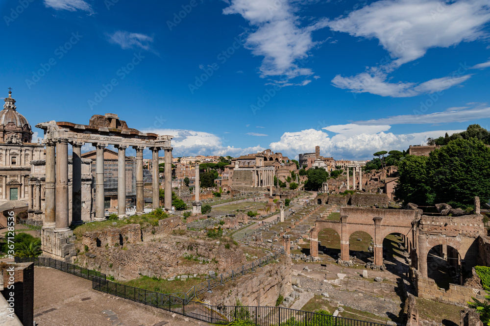 Panorama of roman forum the heart of roman empire. From the Campidoglio they can be seen the Arch of Severus, the temples Saturn and Vesta, Basilica of Maxentius, Arch of Titus, Colosseum Rome, Italy