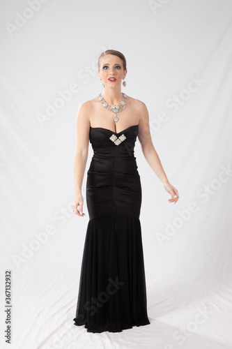 Pretty woman in a formal black dress