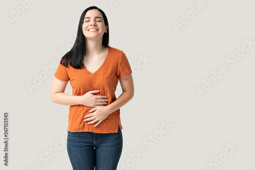 Caucasian Woman Keeping Both Hands On Belly