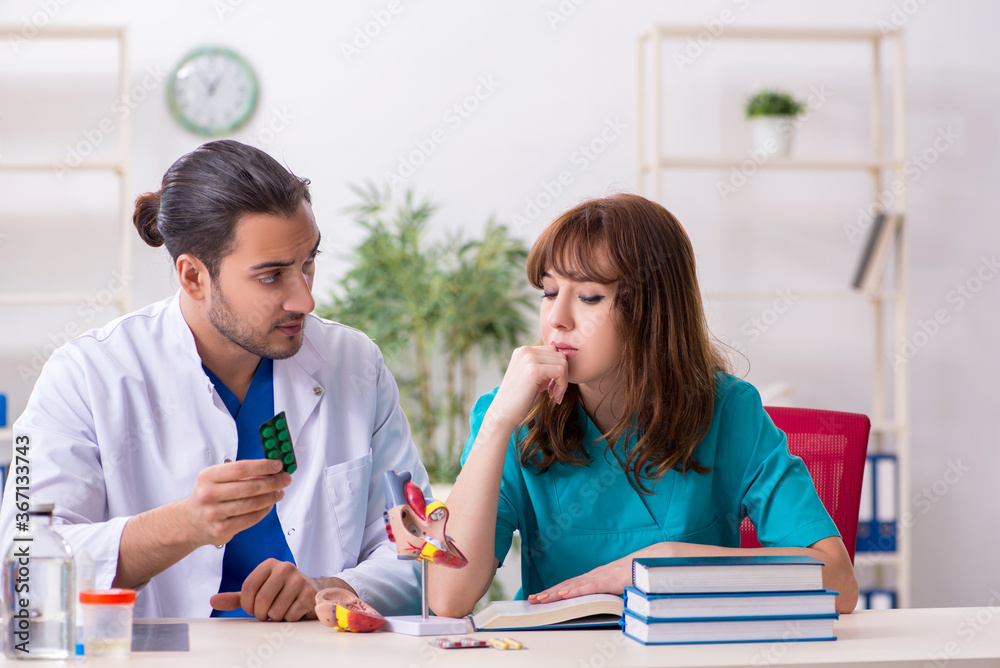 Fototapeta premium Two doctors colleagues working in the hospital