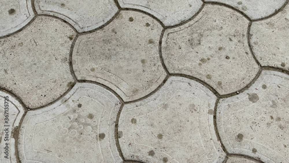 Rain on sidewalk tile. Top view Rain on sidewalk tile. Top view