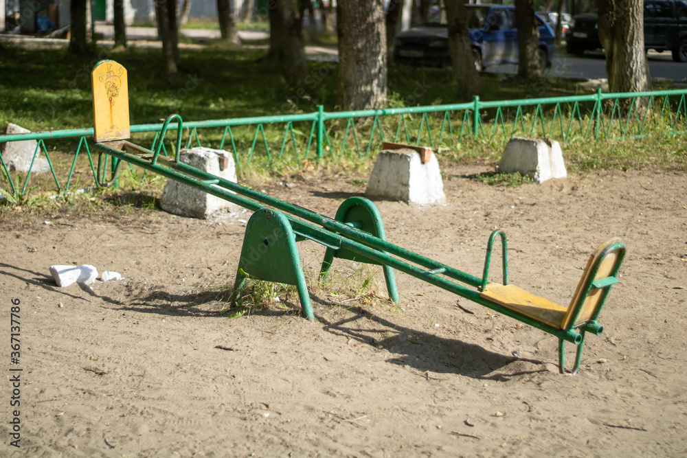 Very old swing for children. Old playground. Very old swing for children. Old playground.