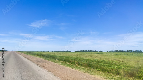 Ufa  Russia June 20  2020 view from a driving car to the road on a sunny day