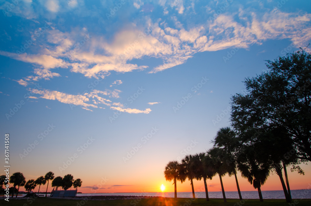 Beauitiful clouds formation during sunrise in the west of florida. Soft focus due to long exposure Beauitiful clouds formation during sunrise in the west of florida. Soft focus due to long exposure