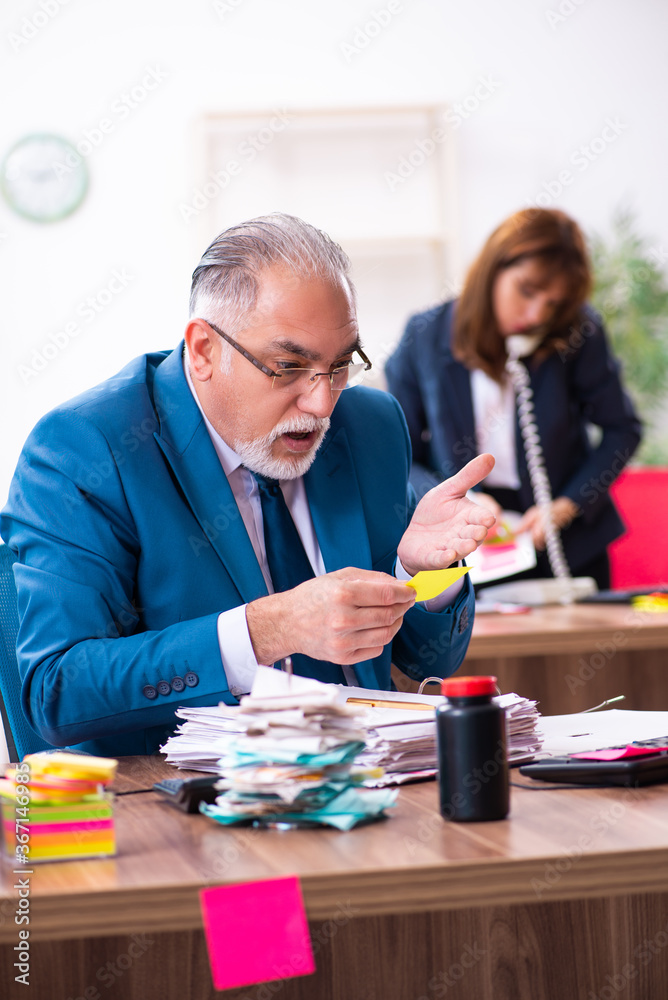 Two employees and excessive work in the office Two employees and excessive work in the office