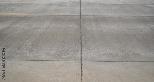 Contraction joint and longitudinal joint made by 
asphalt joints sealant. Longitudinal joint on concrete pavement road construction.