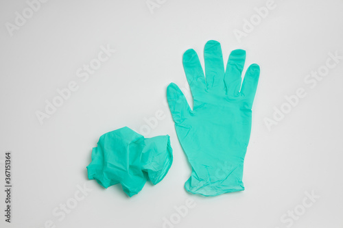 Wallpaper Mural green rubber glove isolated on white background Torontodigital.ca