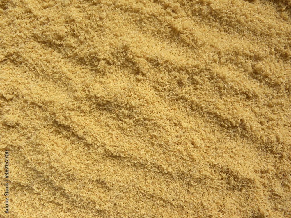 Heap of brown color sugar powder Heap of brown color sugar powder